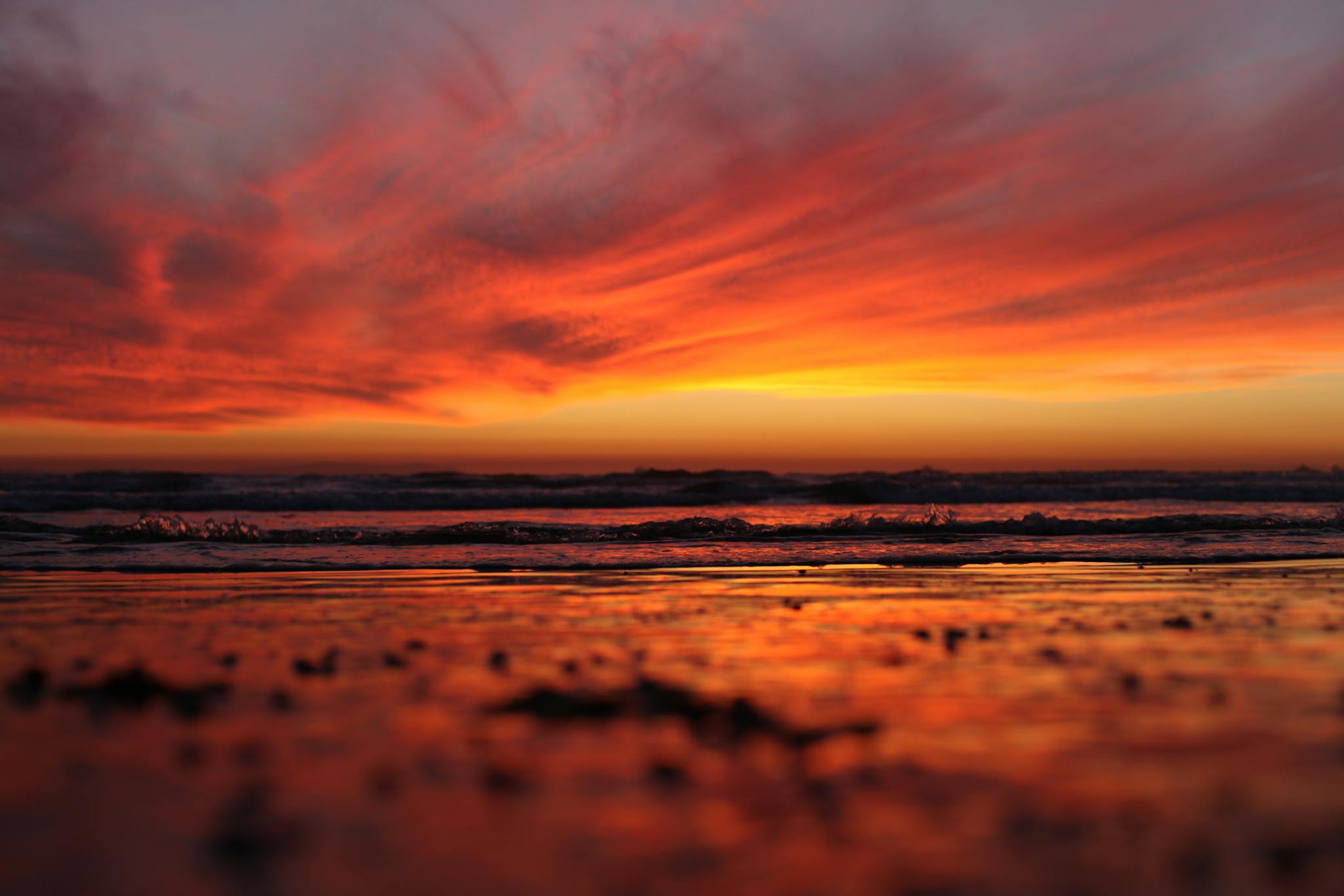 Sunset over the water at Huntington Beach, CA